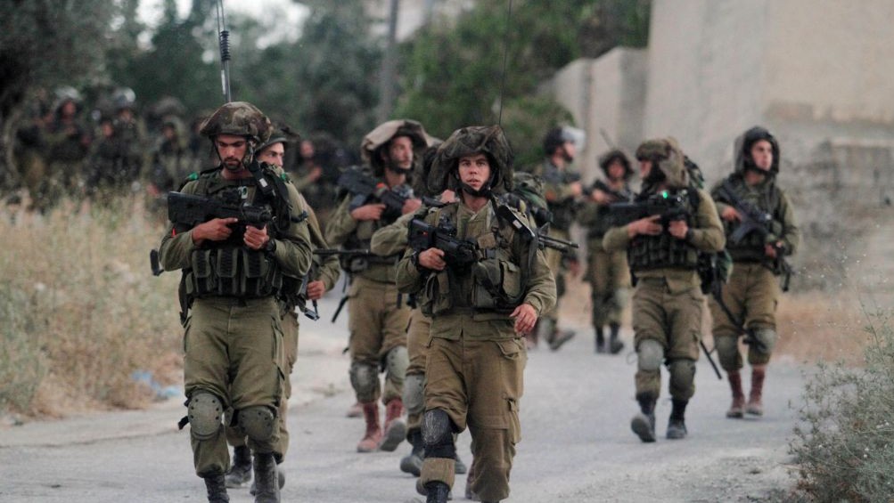 Israeli soldiers patrol near Ramallah
